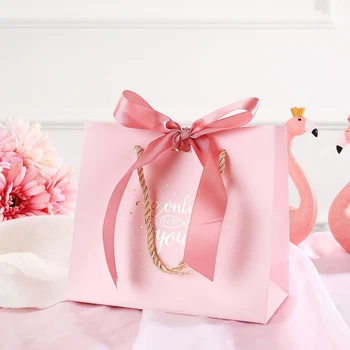 Цена по цена на завода на производителя С отпечатана логото на Розово Опаковъчен Плик С дръжка и лента за подарък пазарска чанта